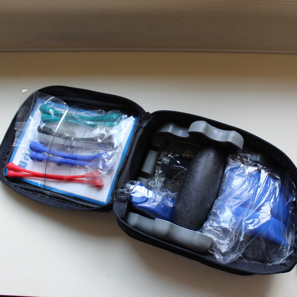Wristiciser exercise kit for wrist, hand, arm, and chest.